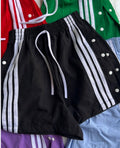 Short con botones a presión